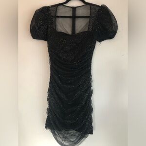 Elegant Black Dress with Glitter Accents